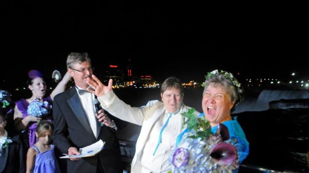 Cheryle Rudd and Kitty Lambert are some of the first people married as New York state embraces same-sex marriage.