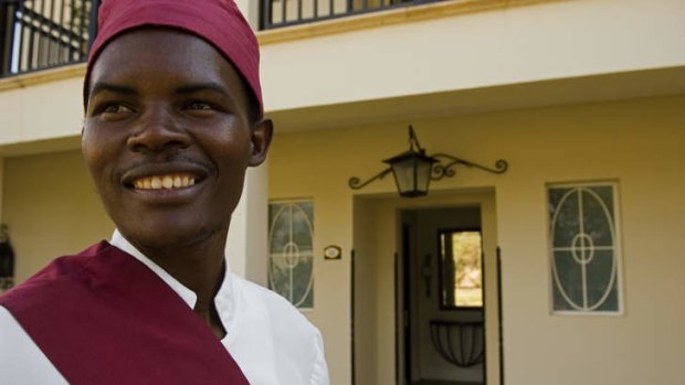 Staff at the Royal Livingstone Hotel wear traditional dress.