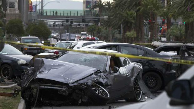 "Like Die Hard" ... wrecked cars on the Las Vegas strip.