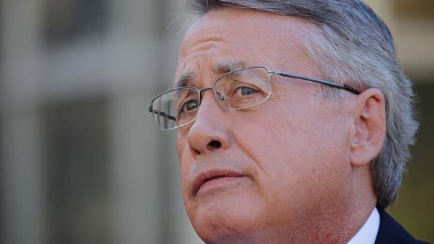 "It's not about them or us, it's about the country": Treasurer Wayne Swan.