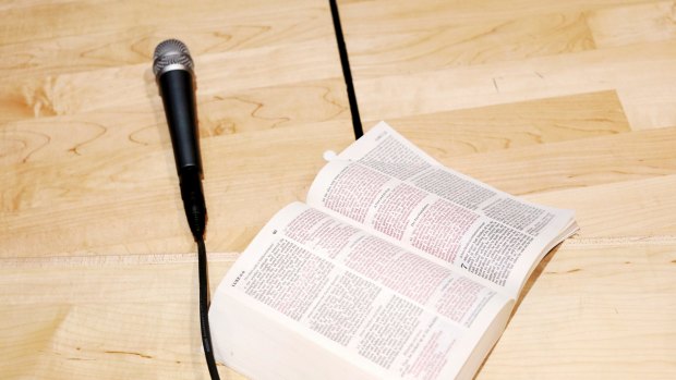 Shane Claiborne's Bible sits next to a microphone at Heritage High School in Lynchburg, Va., April 7, 2018. Claiborne and his evangelical group, the Red Letter Christians, have fierce moral and theological objections to those evangelicals who have latched onto President Donald Trump and the Republican Party. (Travis Dove/The New York Times) Claiborne