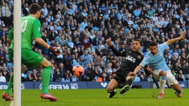 Deja vu: James Perch scores Wigan's second goal to set up the upset victory over Manchester City.