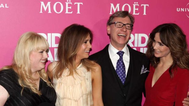 Rebel Wilson with <i>Bridesmaids</i> cast members Kristen Wiig and Rose Byrne and director Paul Feig at the film's premiere in Sydney.