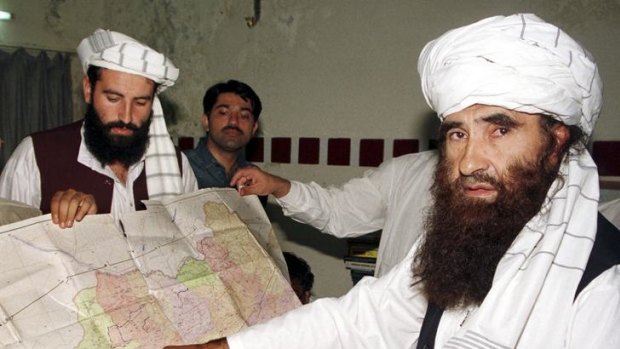 The Taliban's Minister for Tribal Affairs Jalaluddin Haqqani points to a map of Afghanistan.