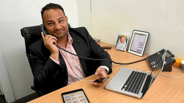Real estate agent Richard Movsessian can't stand to be parted from his phones, iPad and laptop computer.
