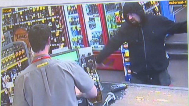 Police have released CCTV images of a robbery at a Liquorland store in Mount Lawley.