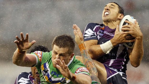 It's raining tries ...  Billy Slater of the Storm catches a high ball to score the match-winning four points.
