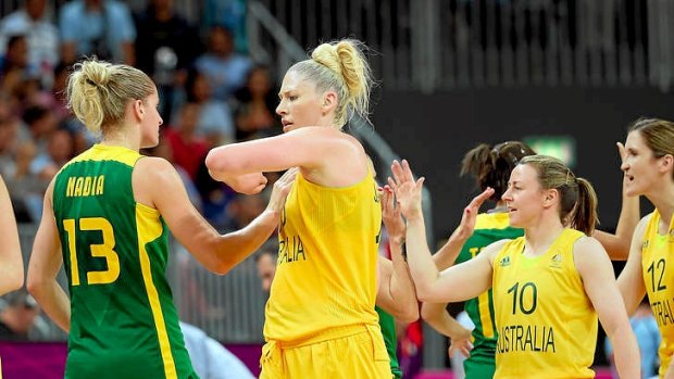 Opals captain Lauren Jackson greets Brazil's Nadia Colhado (number 13) following their London Olympics preliminary match.