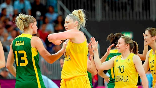 Opals captain Lauren Jackson greets Brazil's Nadia Colhado (number 13) following their London Olympics preliminary match.