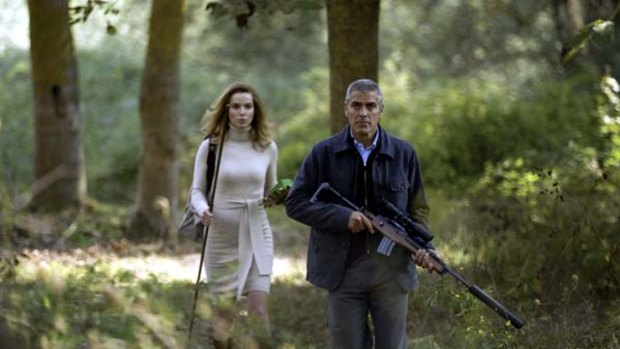 Sharp shooters . . . George Clooney and Thekla Reuten crank up the tension in <i>The American</i>.