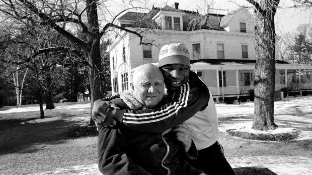 A younger Tyson with his trainer and mentor Cus D’Amato, who died in 1985.