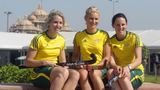Members of the Hockeyroos team from (L-R) Casey Eastham, Kate Hollywood and Madonna Blyth pose inside the athletes village.