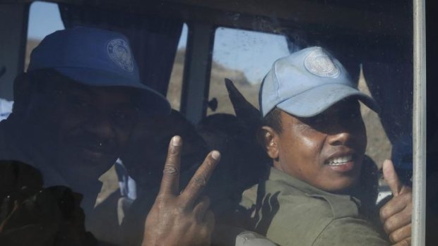 Fijian UN peacekeepers released by al-Qaeda-linked group Nusra Front in Syria arrive in Israeli-held territory on the Golan Heights.