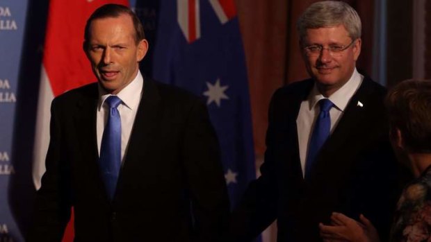 Prime Minister Tony Abbott and Canadian Prime Minister Stephen are increasingly isolated in their push to limit action to mitigate climate change.