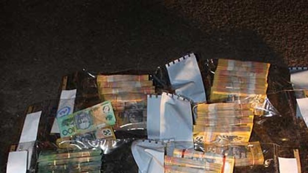 Cash seized by police during the search.