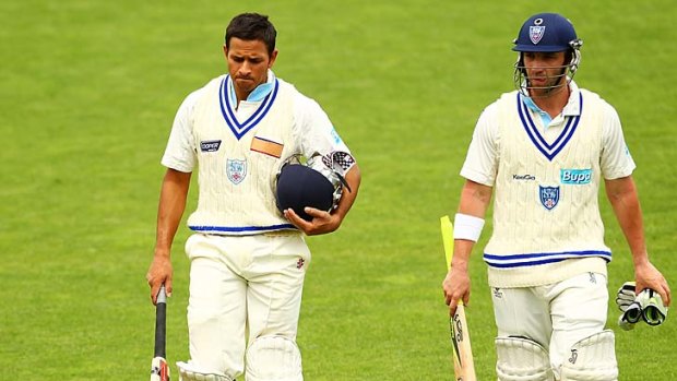 Usman Khawaja and Phillip Hughes are two players whose contracts are in danger.