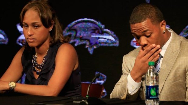 Ray Rice with his wife Janay at a media conference in May.