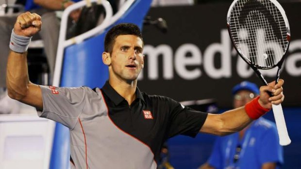 Novak Djokovic of Serbia celebrates defeating Denis Istomin of Uzbekistan.