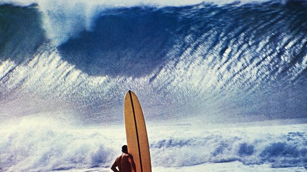 Man and monster: John Severson's famous 1964 shot of Californian surfer Greg Noll contemplating  the most notorious break on Hawaii's North Shore, the Banzai Pipeline.