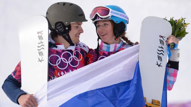 Happy couple: Vic Wild and Alena Zavarzina celebrate their medals.