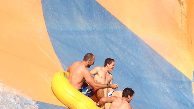 Cats take to water: Geelong players ride the mini-waves at Wet'n'Wild on the Gold Coast yesterday.