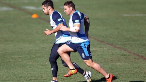 Jarryd Hayne and Anthony Watmough during a training session in Coffs Harbour on Sunday.