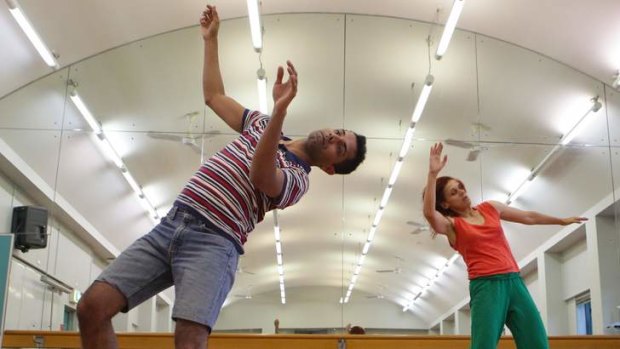 Raghav Handa, left, and Vicki Van Hout during rehearsals for the performance "Slow Dances for Fast Times."