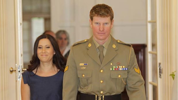 Corporal Daniel Keighran, with his wife Kathryn, has been presented the Victoria Cross medal.