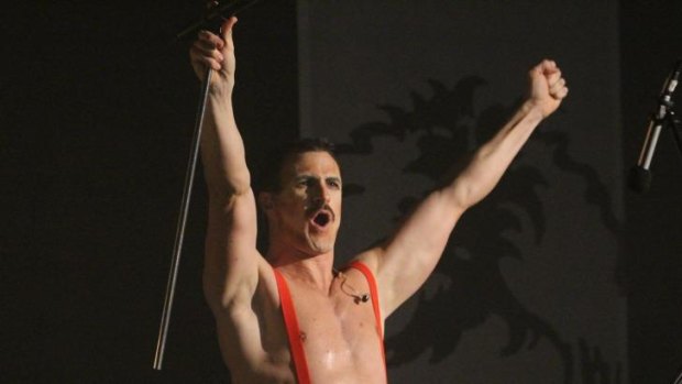Master of suspense... and suspenders: Giles Taylor in Queen: It's a Kinda Magic.