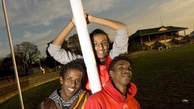 Somalian footballers Mohamed Ahmed (back), Yahe Fitaax and Abdi Fitaax.