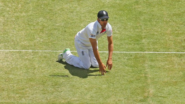 On his knees: Alastair Cook has had a tour to forget.