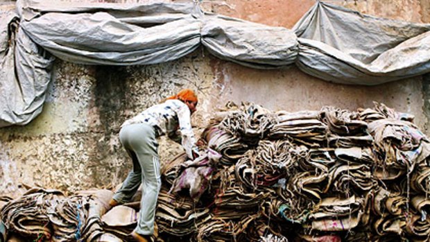 A rag trade worker in Jodhpur where they work for a minimum wage and suffer with health issues usually resulting in early death.