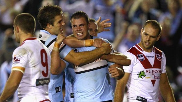 One up &#8230; Cronulla's Wade Graham celebrates a try.
