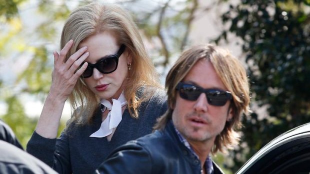 Nicole Kidman and her husband Keith Urban arrive at her parents' house in Sydney.