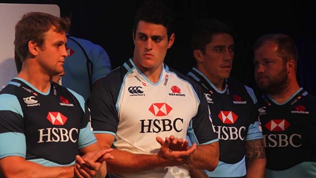 Surprise title &#8230; NSW captain Dave Dennis, in white, at the Waratahs season launch on Wednesday.