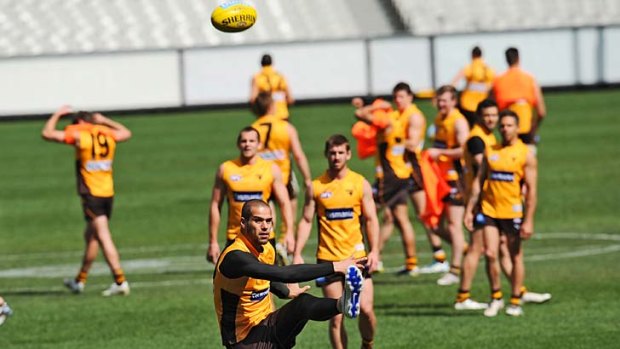 Lance Franklin training away from his teammates this morning.