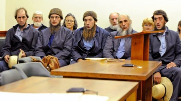 Five of the men convicted in the beard-cutting case (from left) Johnny Mullet, Lester Mullet, Daniel Mullet, Levi Miller and Eli Miller, in court in Millersburg, Ohio, in 2011.