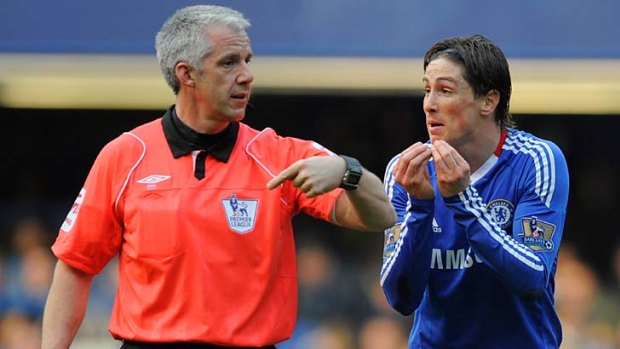 The protestations of Fernando Torres fall on deaf ears at Stamford Bridge.