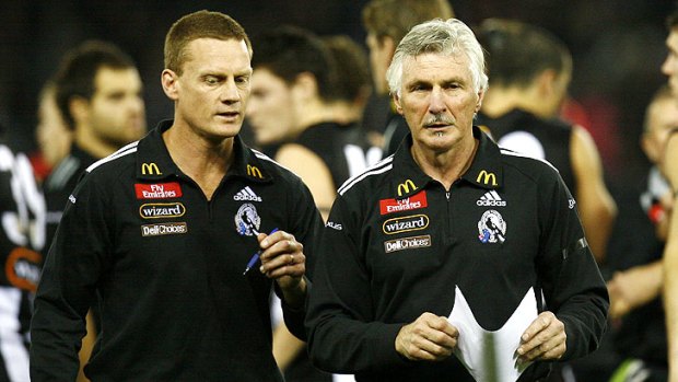 Close ties: Gold Coast coach Guy McKenna (left) with former mentor Mick Malthouse in 2007.