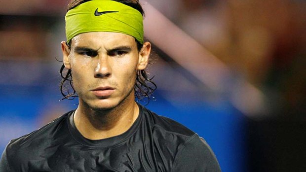 Hitting out ... Rafael Nadal.