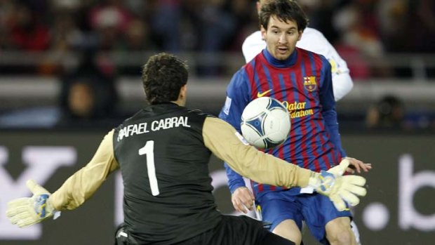 Untouchable ... Lionel Messi scores past Rafael Cabral.