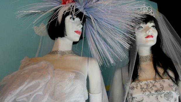 Hers and hers: A San Francisco shop window displays wedding gowns as California gears up for a flood of same-sex nuptials.