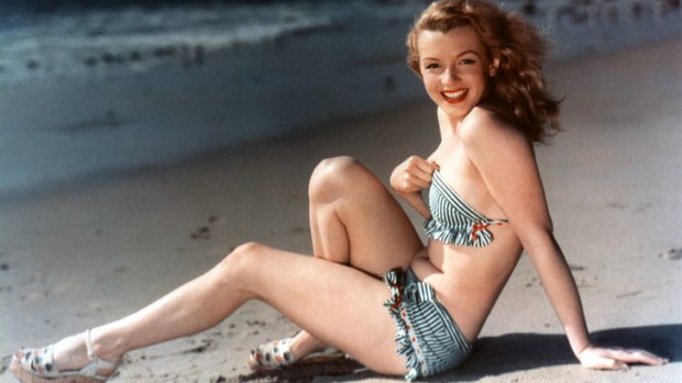 Marilyn on the Beach, Marilyn Monroe posing on the beach in 1949, photographer unknown.