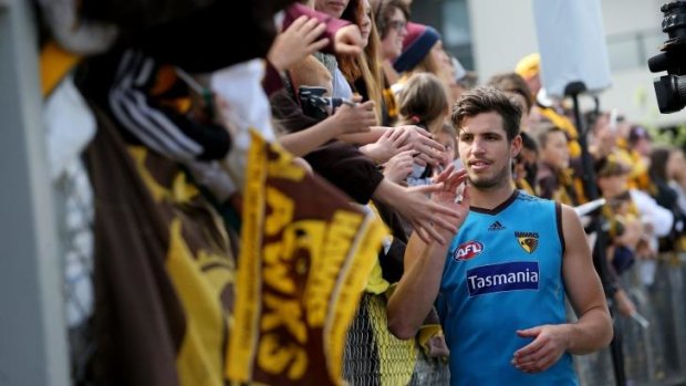 Hawks favourite: Ben Stratton greets enthusiastic fans at Hawthorn’s grand final training session on Thursday.  