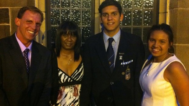 Joshua Hardy with his father David, mother Milly and sister Rebecca, following his graduation from Melbourne Grammar School in 2011.