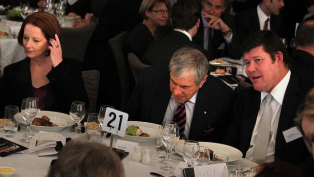 Bad poll day ... Prime Minister Julia Gillard at lunch with Kerry Stokes and James Packer yesterday.