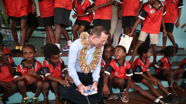Prime Minister Tony Abbott meets with students from Tagai State College on Mer Island 