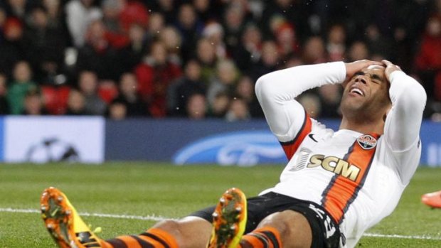 Shakthar Donetsk's Alex Teixeira reacts after missing a chance to score against Manchester United last year.
