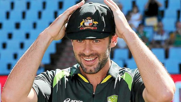 Baggy green: Alex Doolan of Australia is congratulated by teammates after receiving his cap before day one of the First Test match between South Africa and Australia.