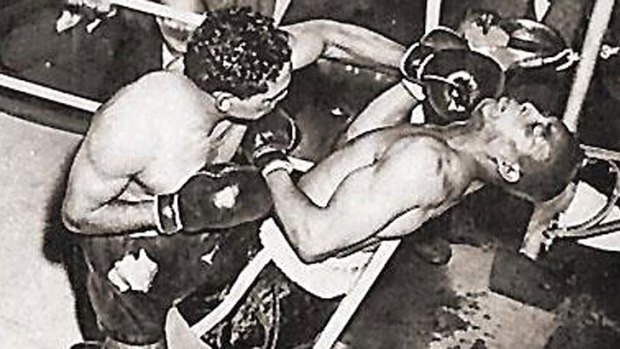 Sweet science &#8230; Dave Sands has American Henry Brimm on the ropes before scoring a KO at Sydney Stadium on August 7, 1950.
